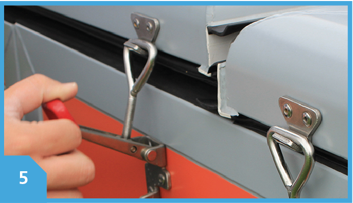 Releasing lid clamps