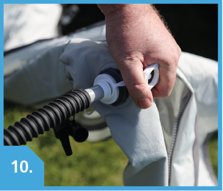 Placing hose into white valve